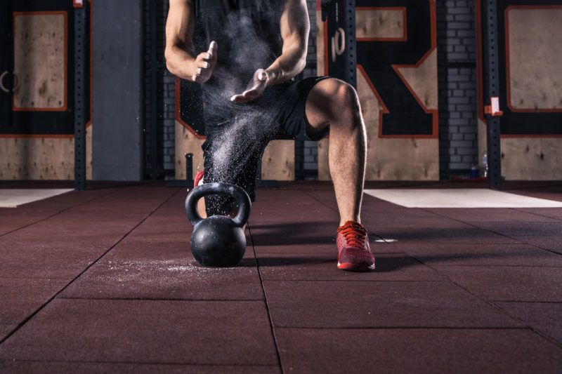 Crossfit athlete ready to lift a kettlebell